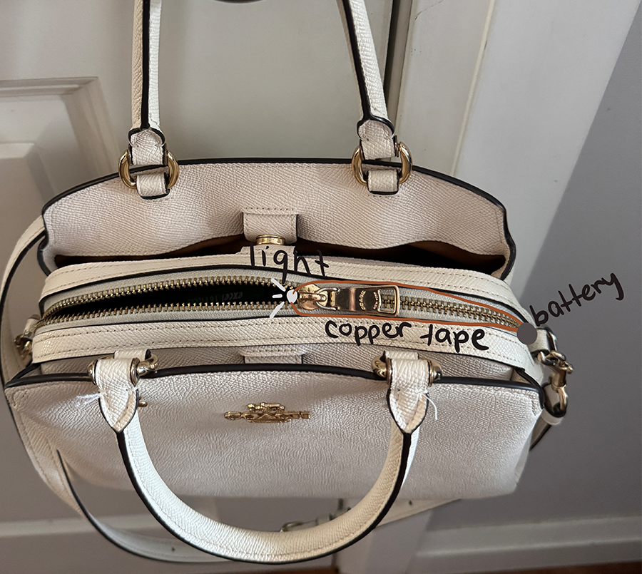 This light is added to the zipper of the purse so that you can see inside your purse when it opens.