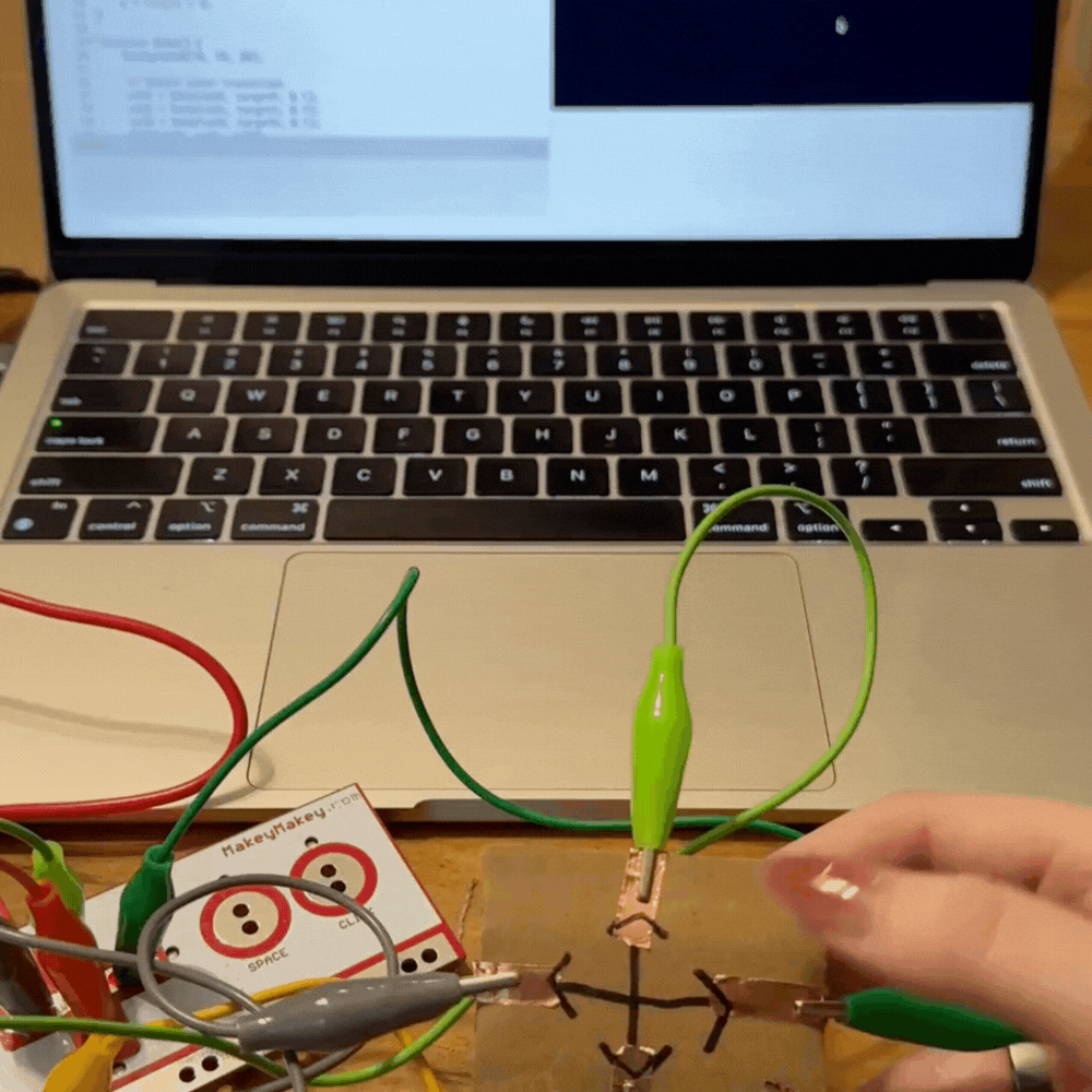 cardboard prototype with arrows on it.