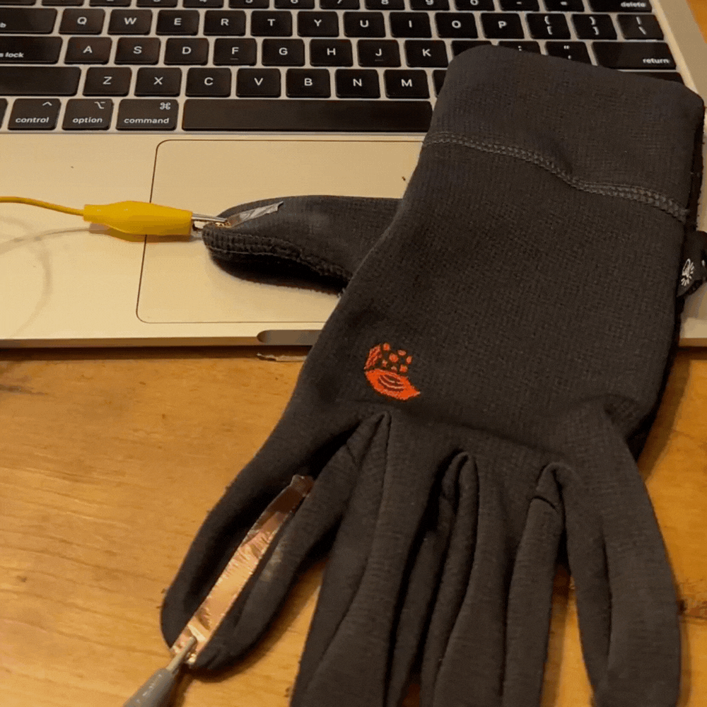 glove with copper tape on two fingers
