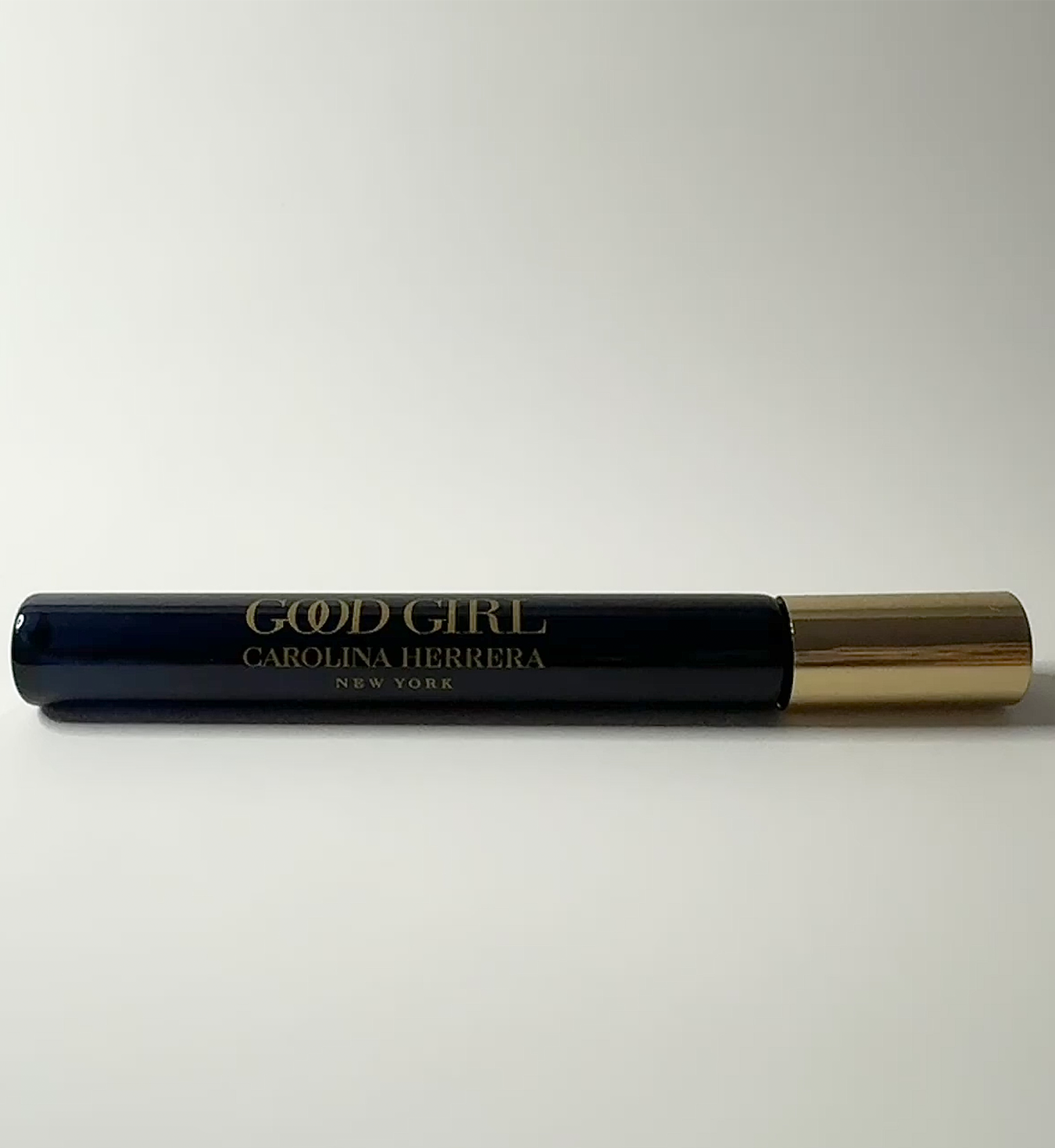 image of the side view of Good Girl perfume in a travel size